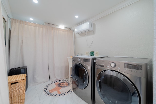 washroom with tile patterned floors, crown molding, washing machine and clothes dryer, and a wall mounted air conditioner