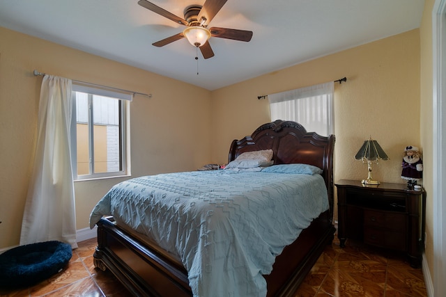 bedroom featuring ceiling fan