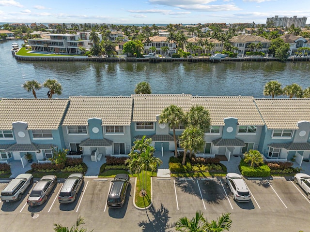 bird's eye view with a water view