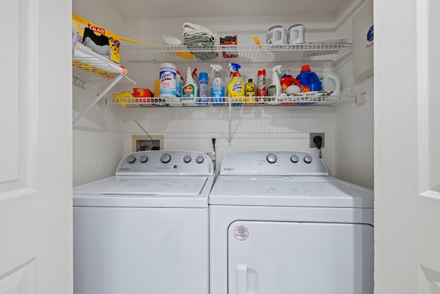 laundry room with independent washer and dryer