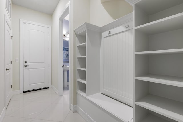 mudroom with light tile patterned floors