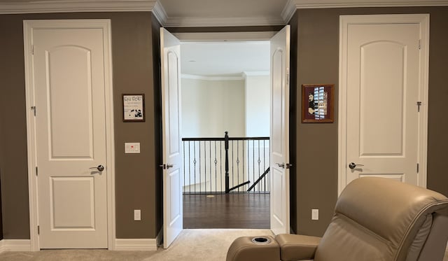 living area with light carpet and ornamental molding