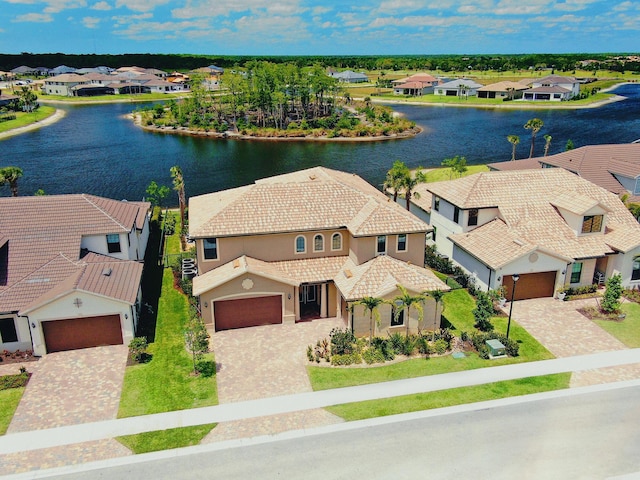 drone / aerial view with a water view