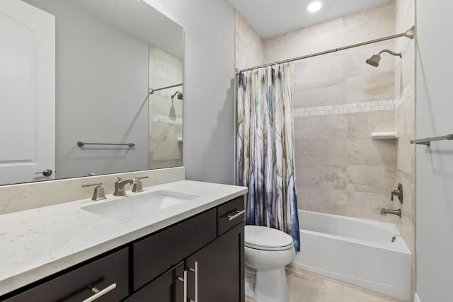 full bathroom with shower / bath combination with curtain, vanity, and toilet