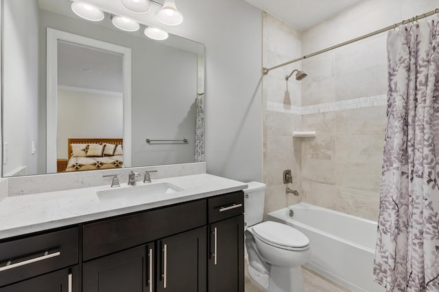 full bathroom featuring shower / bath combination with curtain, toilet, and vanity