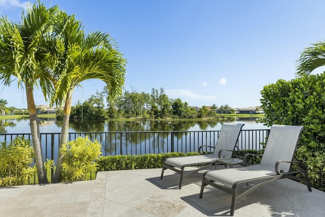 view of patio / terrace with a water view