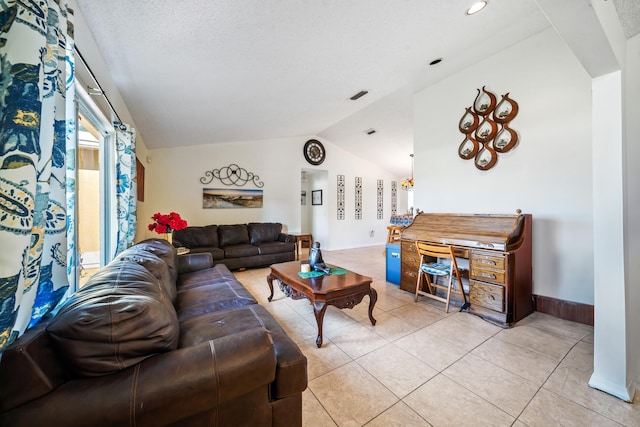 tiled living room featuring a textured ceiling and vaulted ceiling