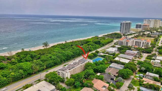 bird's eye view with a view of the beach and a water view