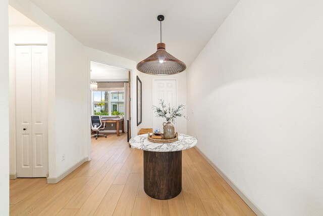 hallway with light wood-type flooring