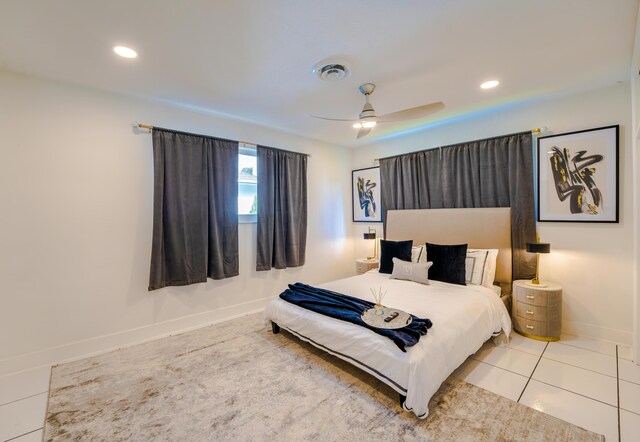 bedroom featuring ceiling fan and light tile patterned floors