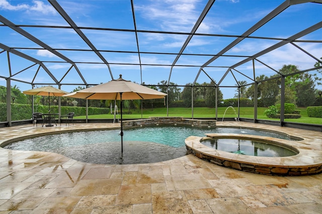 view of swimming pool featuring glass enclosure, a yard, pool water feature, an in ground hot tub, and a patio