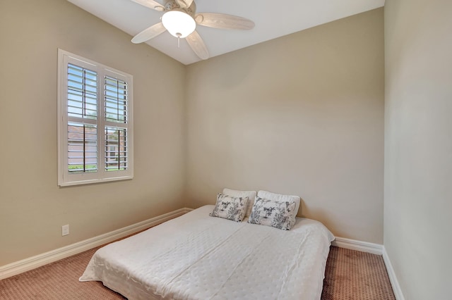 bedroom featuring ceiling fan and carpet floors