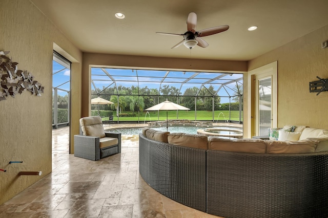 exterior space featuring pool water feature, an outdoor living space, and a lanai