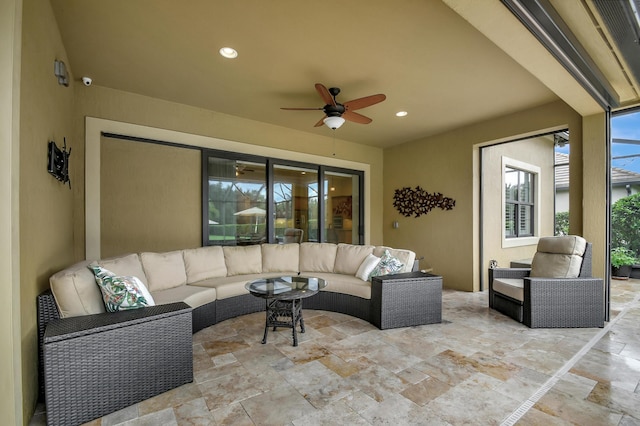 view of patio with ceiling fan and an outdoor hangout area