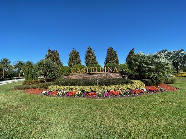 community / neighborhood sign featuring a yard