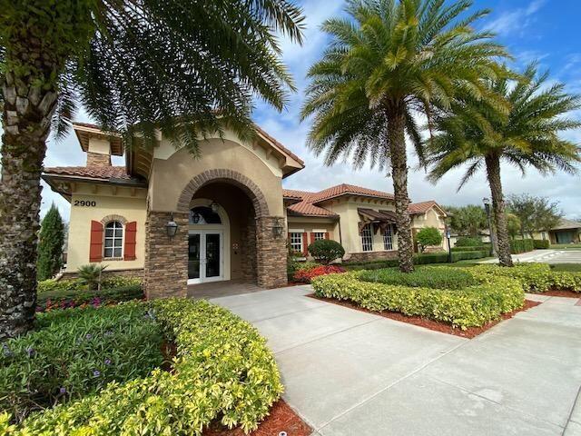 mediterranean / spanish-style house with french doors