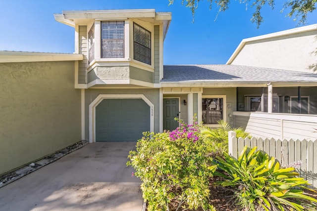 view of front of property with a garage