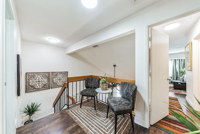 living area featuring dark wood-type flooring