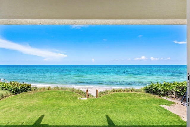 view of water feature with a beach view