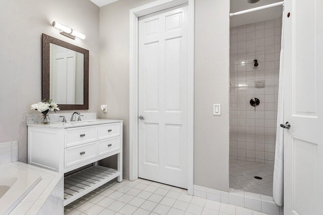 bathroom with separate shower and tub, vanity, and tile patterned flooring