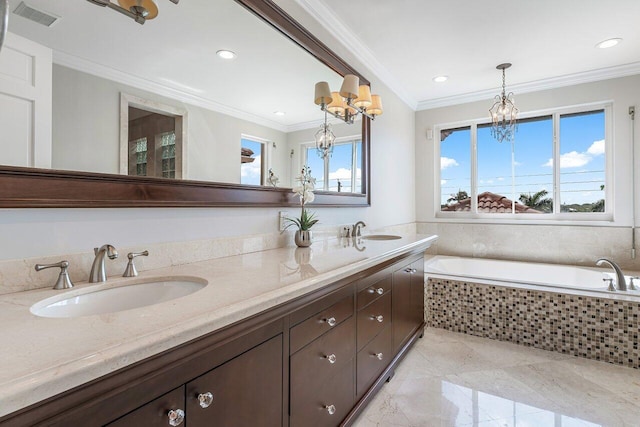 bathroom featuring a relaxing tiled tub, ornamental molding, vanity, and an inviting chandelier