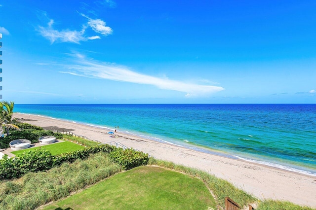 view of water feature with a beach view