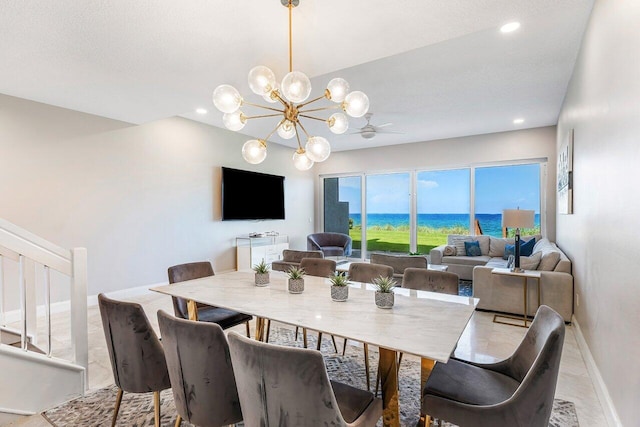 dining space featuring an inviting chandelier