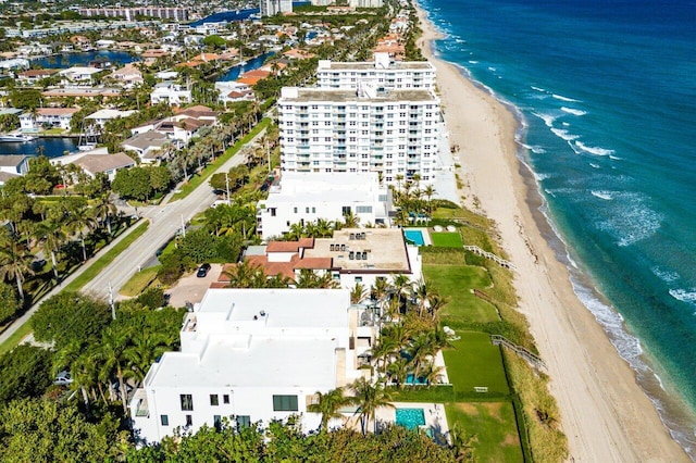 aerial view featuring a water view and a beach view