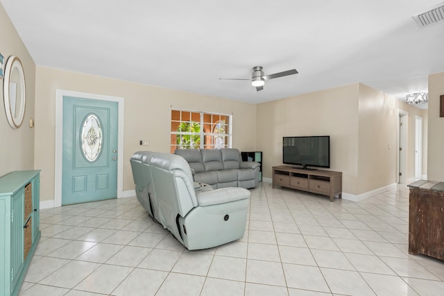 carpeted living room with ceiling fan