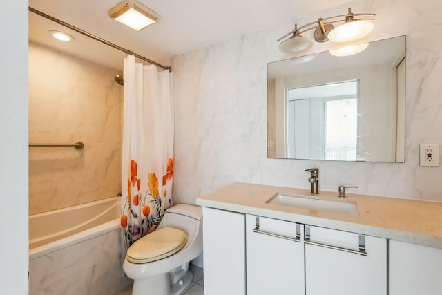 full bathroom with vanity, shower / bath combo with shower curtain, tile patterned floors, tile walls, and toilet