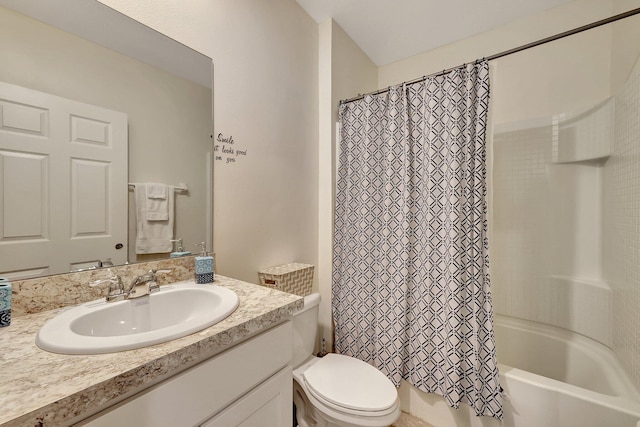 full bathroom with vanity, shower / bath combo, and toilet