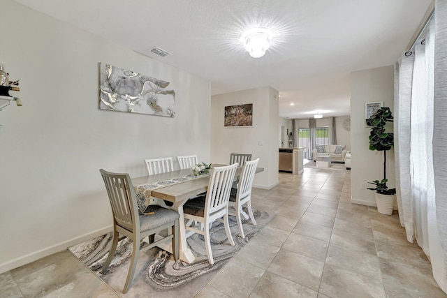 view of tiled dining area