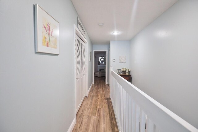 hallway with light wood-type flooring