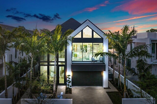 view of front of home with a garage