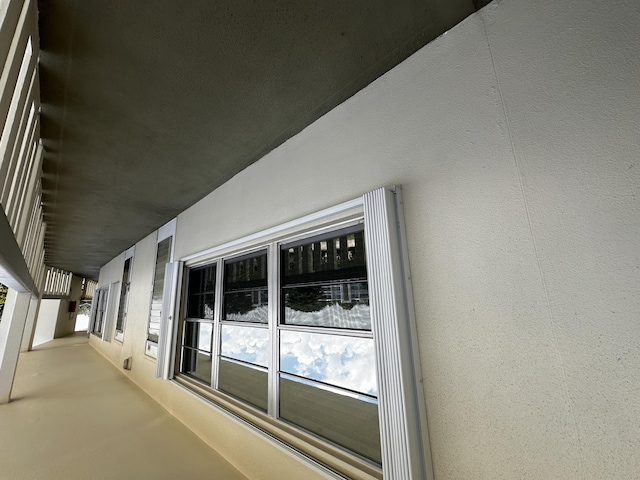 interior space with stucco siding