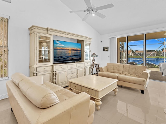 tiled living room with high vaulted ceiling and ceiling fan