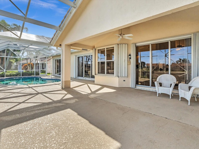 exterior space with ceiling fan and a lanai