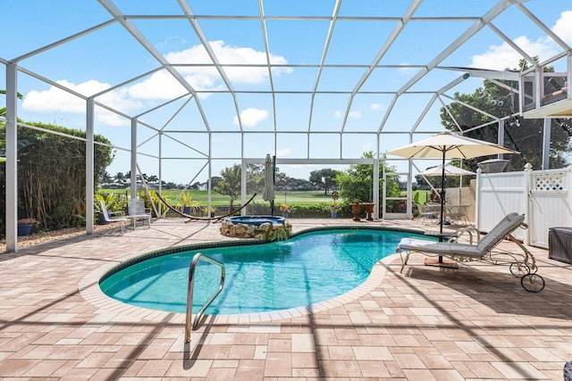 view of pool featuring a lanai and a patio area