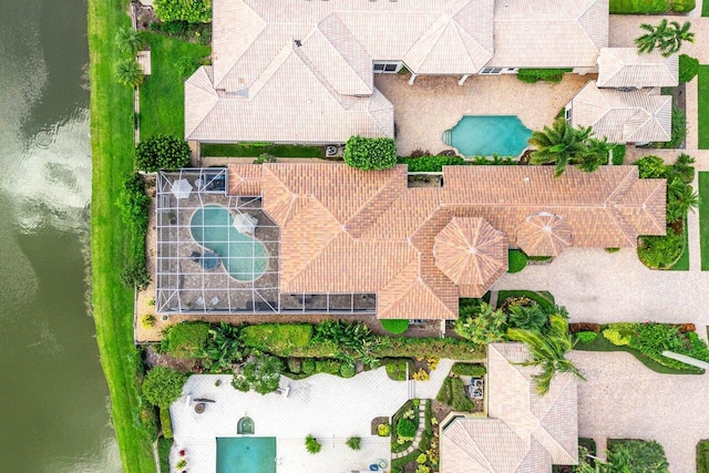 birds eye view of property featuring a water view