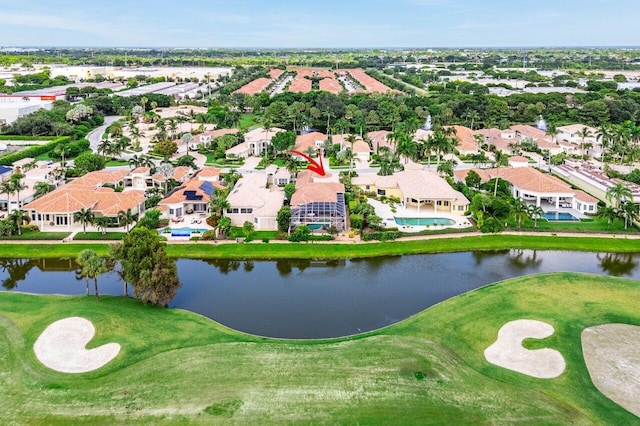 drone / aerial view with a water view