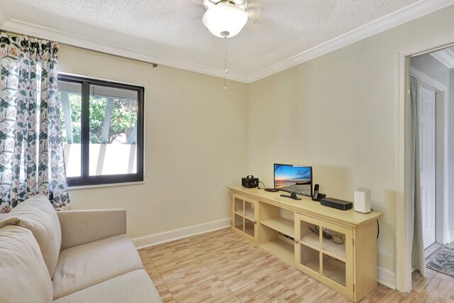 office with a textured ceiling and crown molding