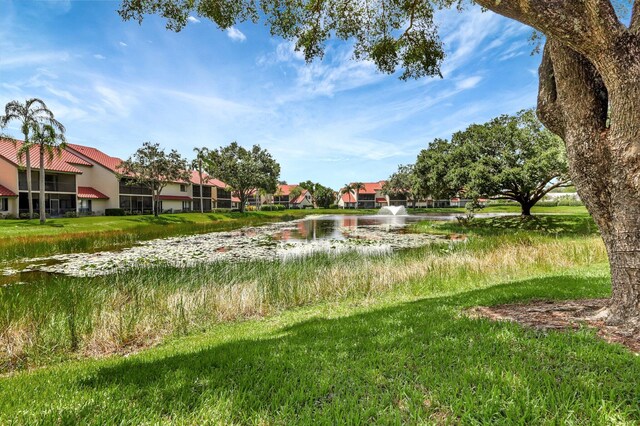 view of yard with a water view