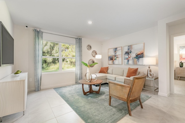 living room with light tile patterned floors