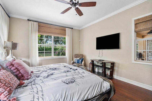 bedroom featuring crown molding, ceiling fan, and dark hardwood / wood-style flooring