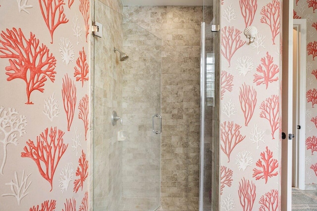 interior details with an enclosed shower