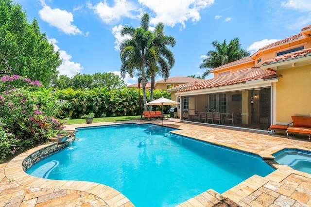 view of pool with a patio area