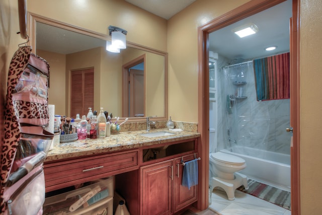 full bathroom featuring vanity, toilet, tiled shower / bath combo, and tile patterned flooring