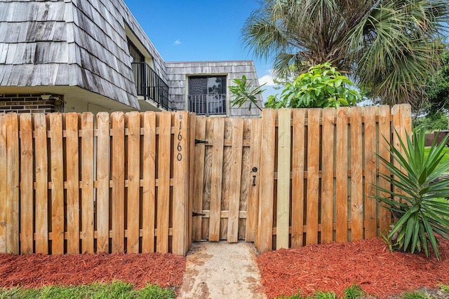 exterior space with a gate and fence