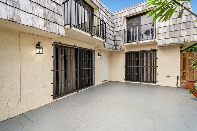 view of patio / terrace with a balcony