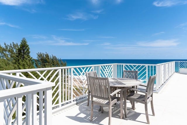 balcony featuring a water view